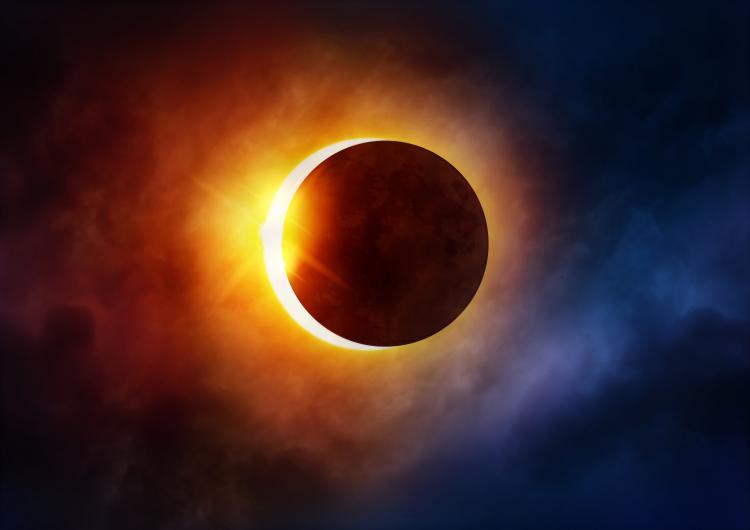 Partial solar eclipse clouds