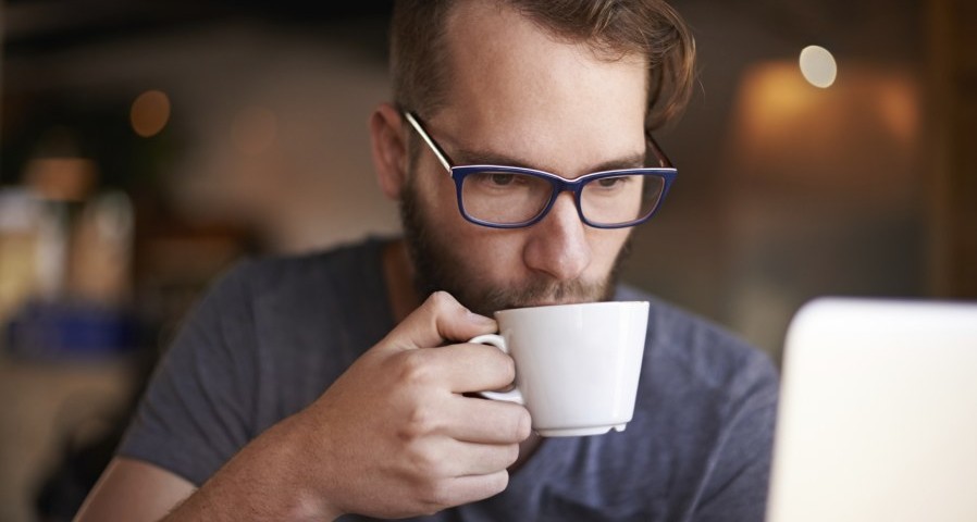 Man drinking coffee 898x480
