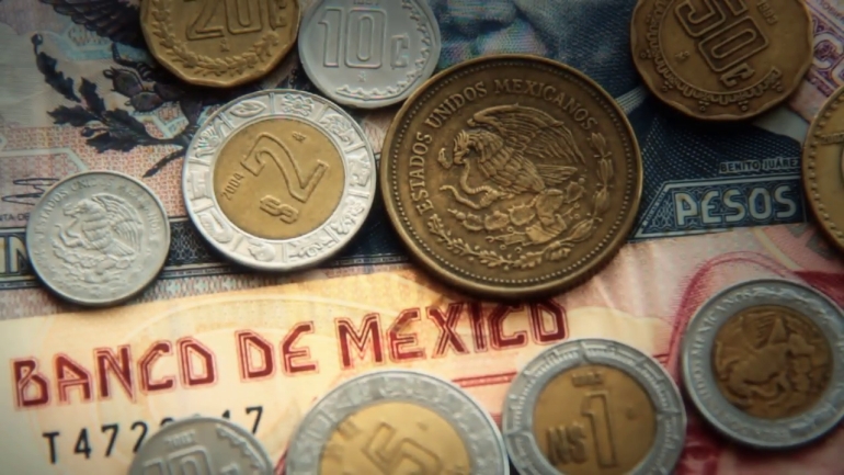 Mexican pesos 2 mexican paper money and metal coin currency blurred and goes into focus slowly v1pv woc f0009